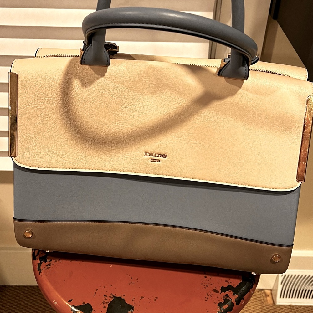 Beautiful notebook convertible shoulder handbag.
